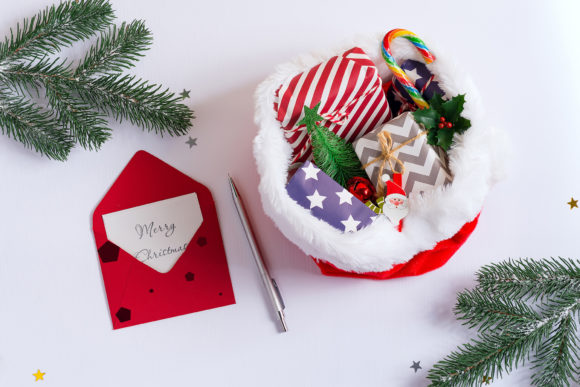 Strategic Application of Christmas Red Santa s Hat Card Mockup for Brand Visibility